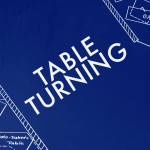 A design based on a diagram of a séance room on a blue background. Text in the centre of the image reads "TABLE TURNING".